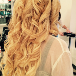 Woman with curly blonde hair