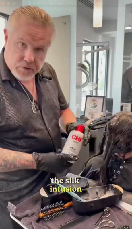 Master hairstylist David Barron with CHI Silk Infusion bottle.