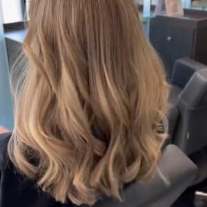 Honey blonde hair color and highlights.