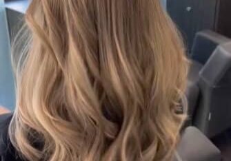 Honey blonde hair color and highlights.