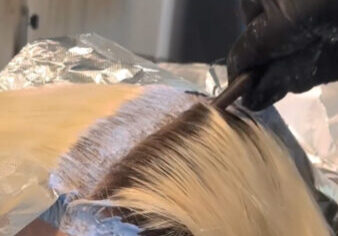 Showing an apprentice a Blonde haircolor root touchup at Barrons London Salon in Buckhead Atlanta
