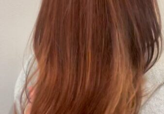 Deep brown red hair color and haircut by Nani