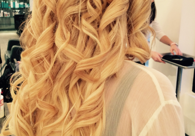 Woman with curly blonde hair