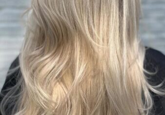long icy blonde hair color and highlights with an extension fill